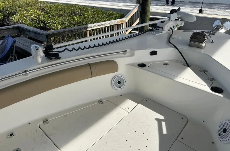 Slide: The Image of 2019 Key West 244 Center Console boat interior with seating and fishing equipment. - 22