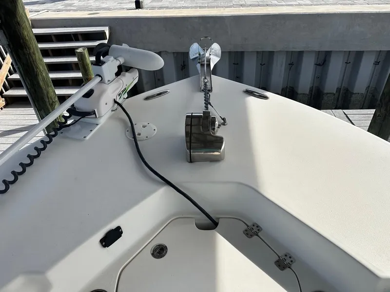 Slide: The Image of 2019 Key West 244 Center Console boat bow with anchor and trolling motor. - 24