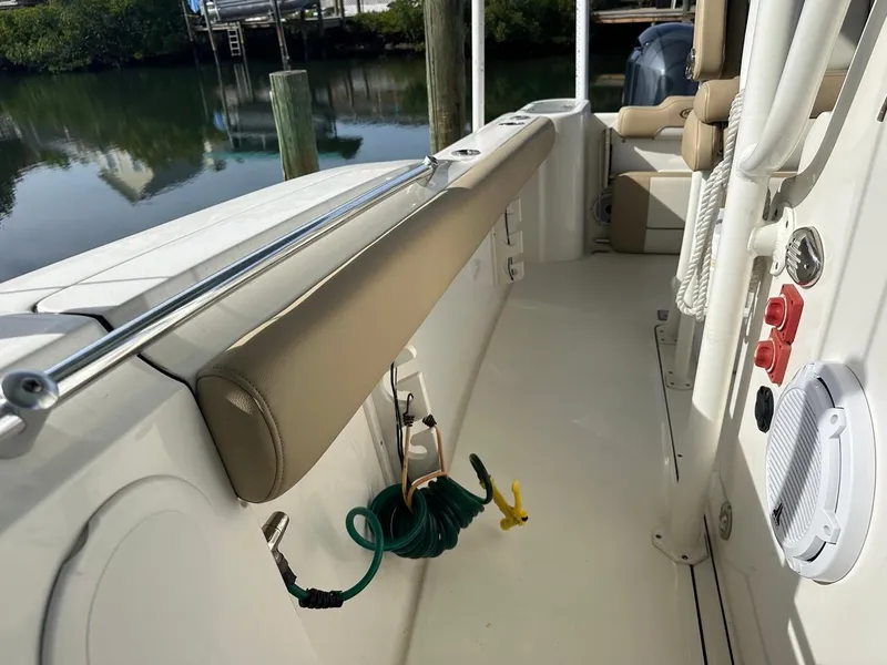 Slide: The Image of 2019 Key West 244 Center Console boat interior with seating and equipment. - 31