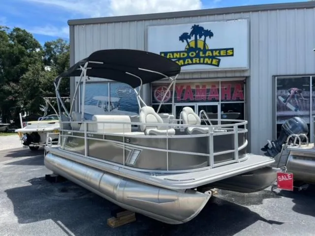 The Image of 2023 SunChaser Vista 18 Fish pontoon boat displayed at Land O' Lakes Marine dealership. - 0