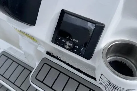Slide: The Image of JL Audio system on 2025 Tidewater 220 CC Adventure boat dashboard. - 11
