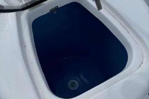 Slide: The Image of Livewell compartment on 2025 Tidewater 220 CC Adventure boat. - 12