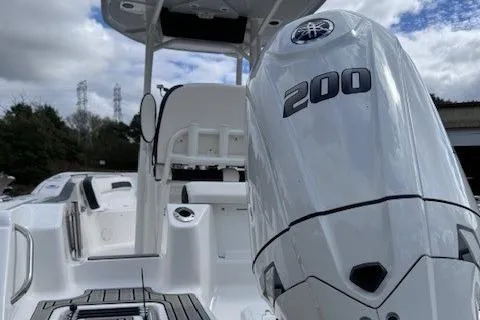 Slide: The Image of 2025 Tidewater 220 CC Adventure boat with powerful 200 HP engine, sleek design. - 18