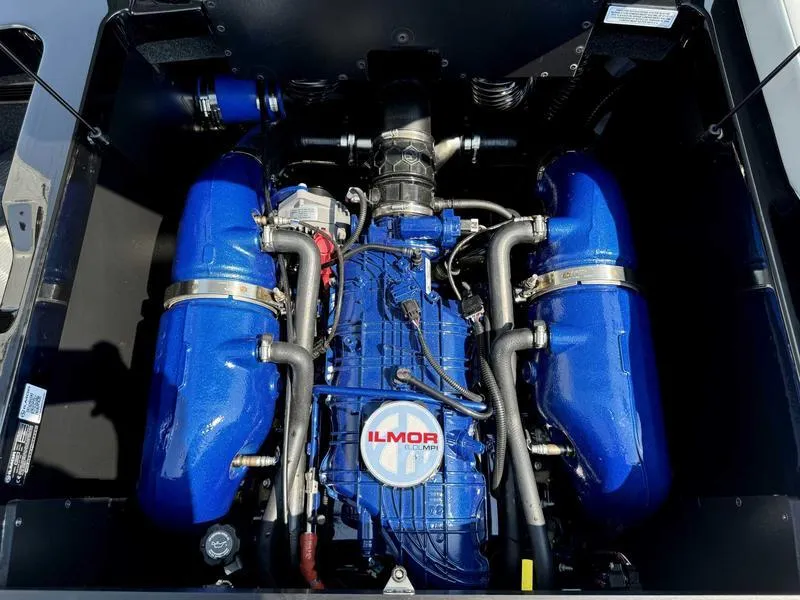 Slide: The Image of 2025 MasterCraft NXT22 engine with blue Ilmor components, showcasing advanced marine engineering. - 12