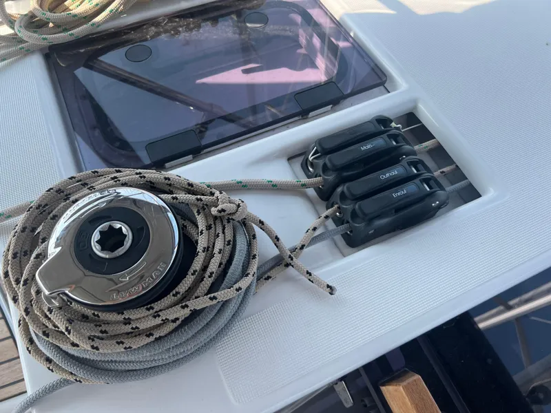 Slide: The Image of Dufour 360 sailboat deck with winch and rope clutches, 2021 model. - 12