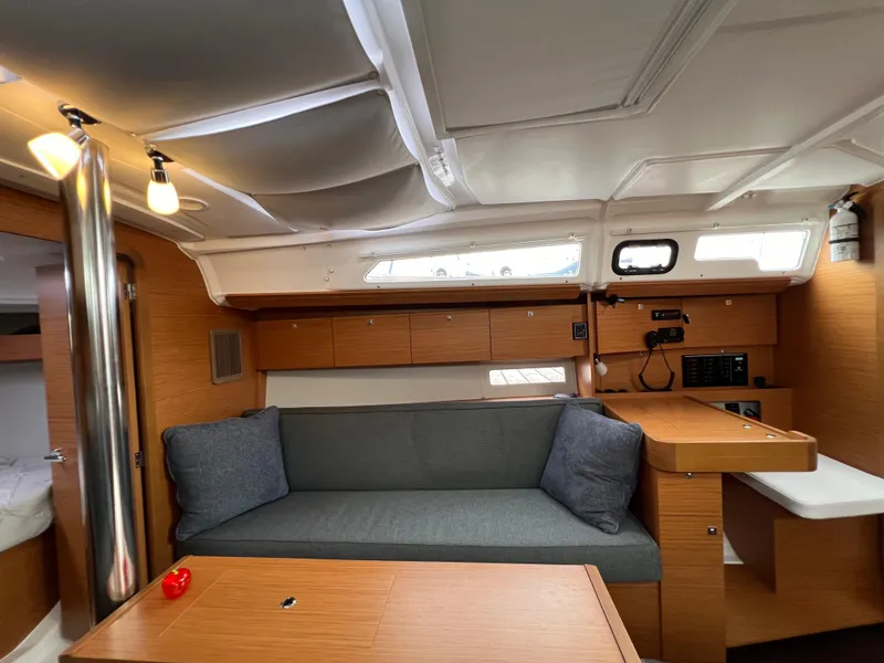 Slide: The Image of Interior of 2021 Dufour 360 sailboat with cozy seating and wooden cabinetry. - 40