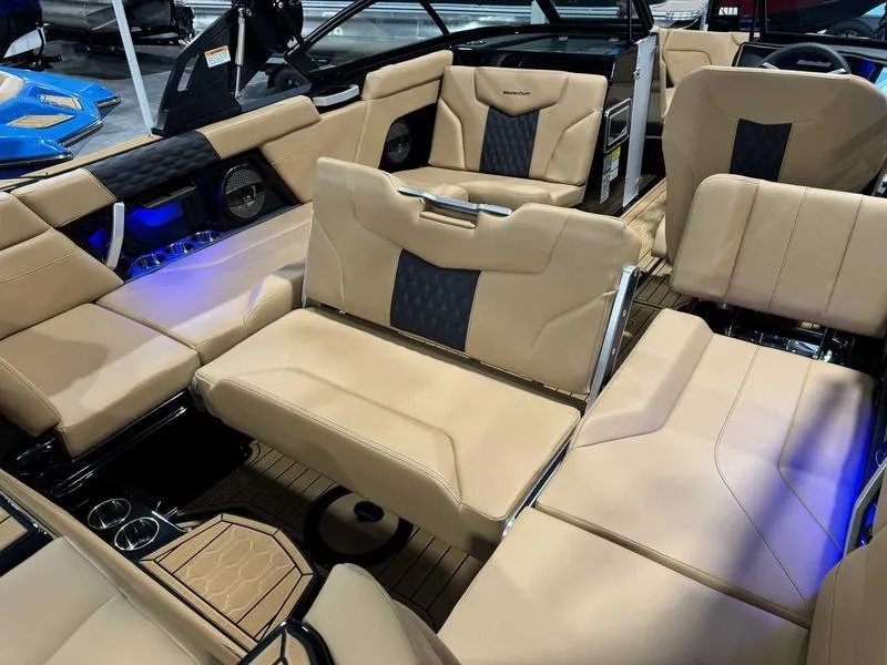 Slide: The Image of Luxurious interior of 2025 MasterCraft XT23 boat with beige seating and modern design. - 13