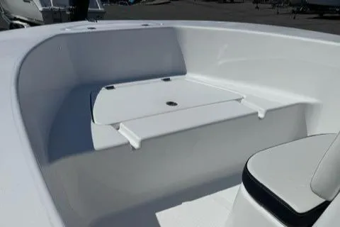 Slide: The Image of 2025 Tidewater 180 CC Adventure boat interior with seating area. - 3