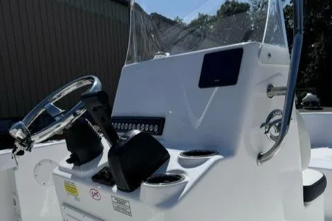 Slide: The Image of 2025 Tidewater 180 CC Adventure boat console with steering wheel and controls. - 6