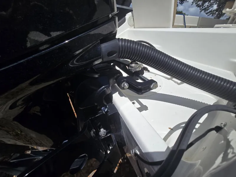 Slide: The Image of Close-up of 2022 Bayliner Trophy T20CC boat engine components. - 25