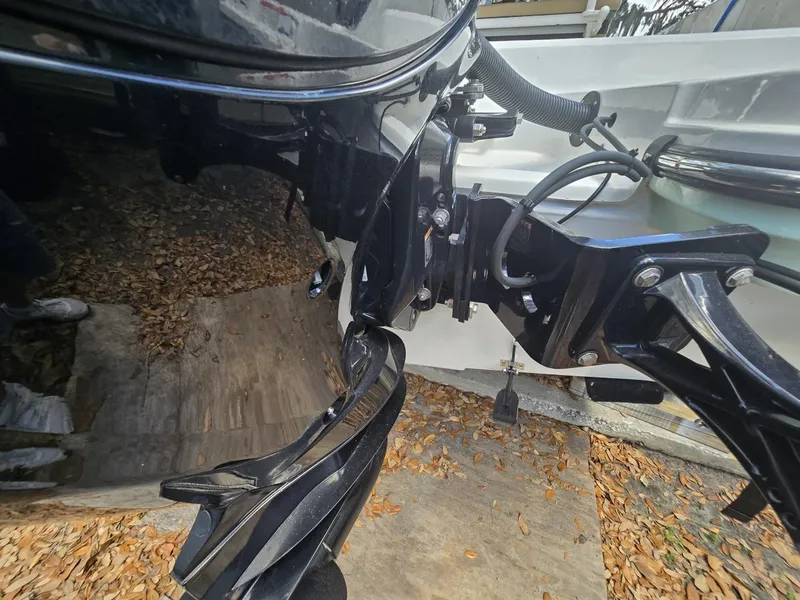 Slide: The Image of 2022 Bayliner Trophy T20CC boat engine and propeller detail. - 27