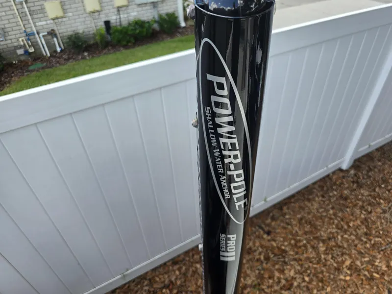 Slide: The Image of Power-Pole shallow water anchor on 2022 Bayliner Trophy T20CC boat. - 32