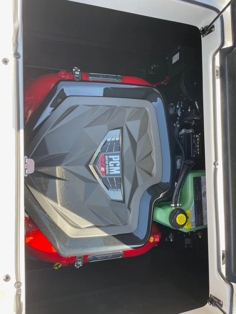 Slide: The Image of Engine compartment of 2025 Nautique Super Air Nautique GS22 boat. - 13