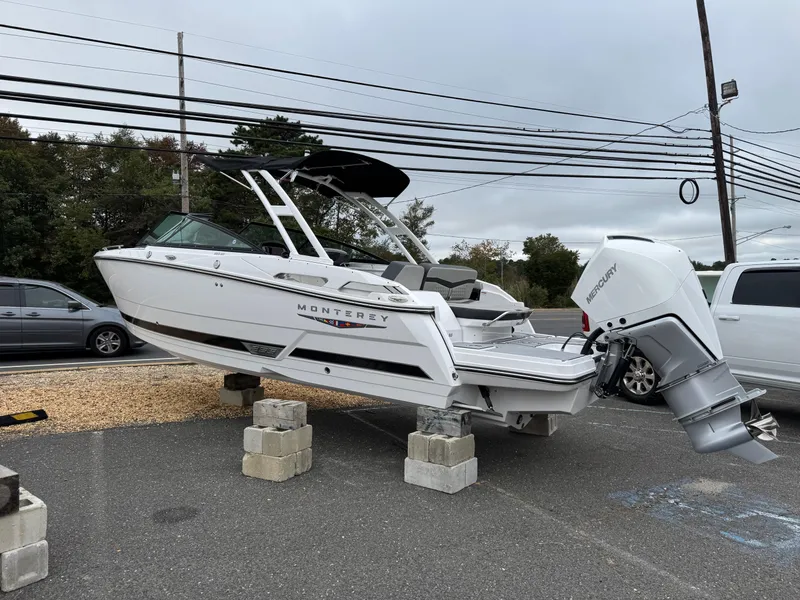 The Image of 2025 Monterey 255 Super Sport boat on display, elevated on blocks. - 0