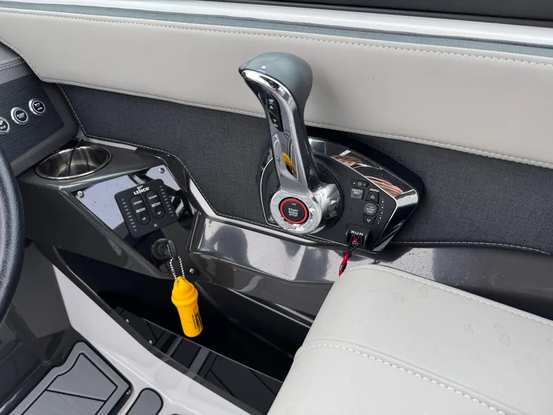 Slide: The Image of 2025 Monterey 255 Super Sport boat throttle and control panel. - 10