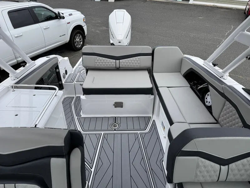 Slide: The Image of 2025 Monterey 255 Super Sport boat interior with modern seating and sleek design. - 12