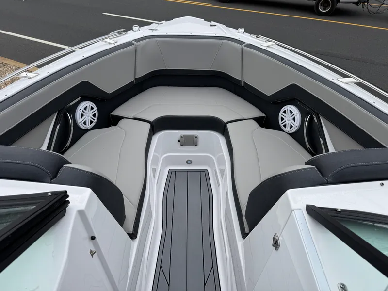 Slide: The Image of 2025 Monterey 255 Super Sport boat interior with sleek seating and modern design. - 13