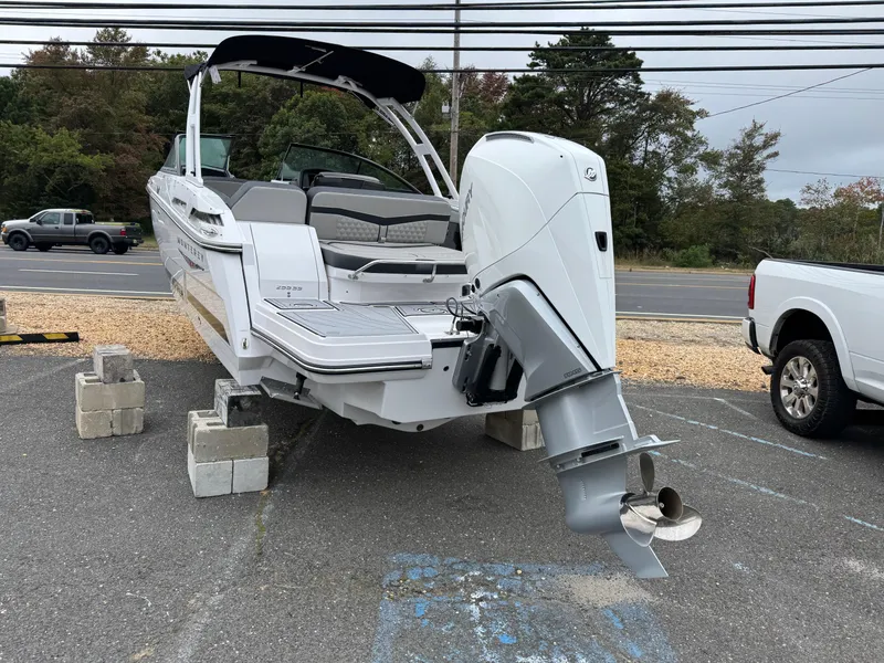 Slide: The Image of 2025 Monterey 255 Super Sport boat on display, elevated on blocks. - 7