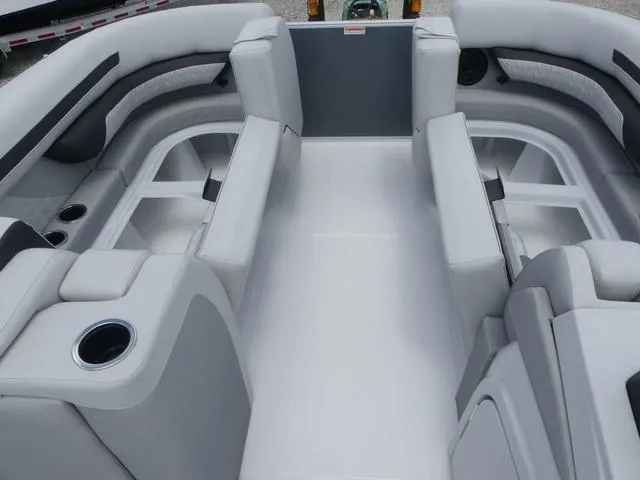 Slide: The Image of 2025 Hurricane FunDeck 2360 RE OB boat interior with spacious seating and cup holders. - 12