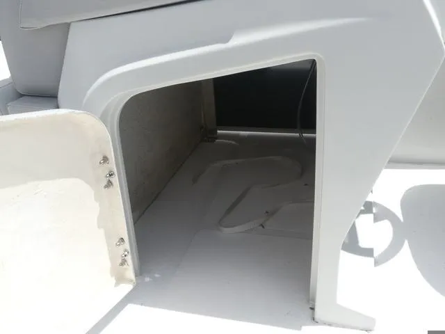 Slide: The Image of Storage compartment of 2025 Hurricane FunDeck 2360 RE OB boat. - 14