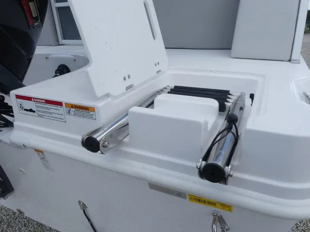 Slide: The Image of 2025 Hurricane FunDeck 2360 RE OB boat ladder and storage compartment. - 25