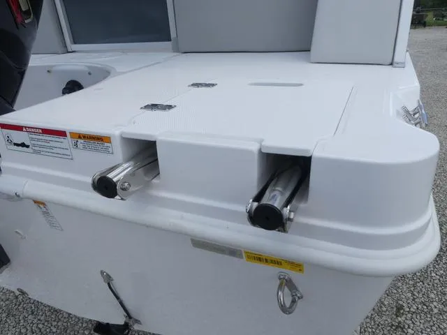 Slide: The Image of 2025 Hurricane FunDeck 2360 RE OB boat stern with ladder and safety warnings. - 26