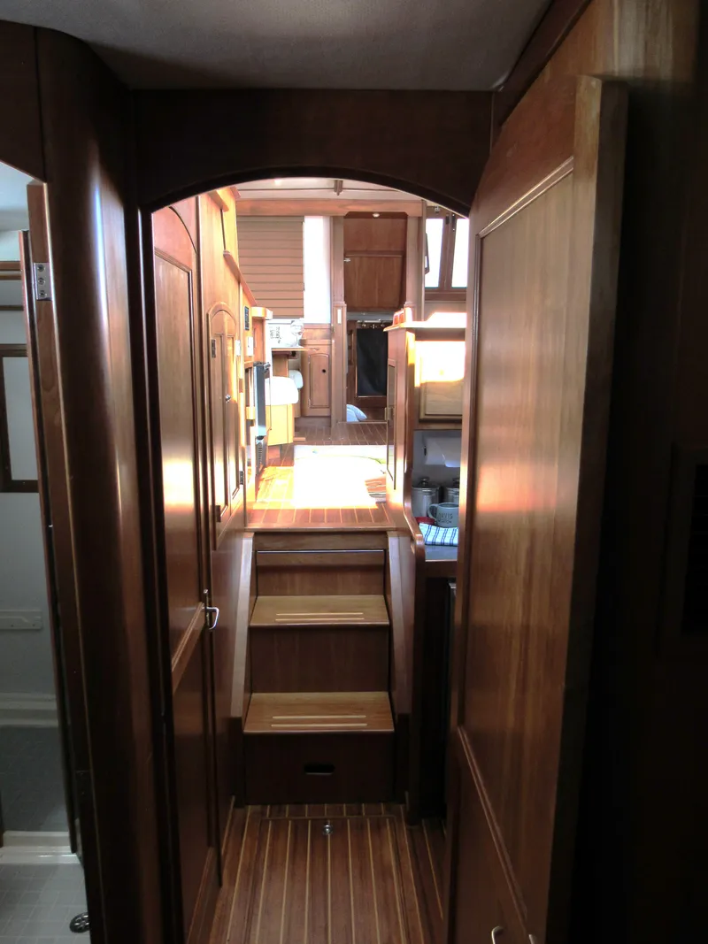 Slide: The Image of Interior of 1999 Sabreline 47 yacht with wooden cabinetry and flooring. - 15
