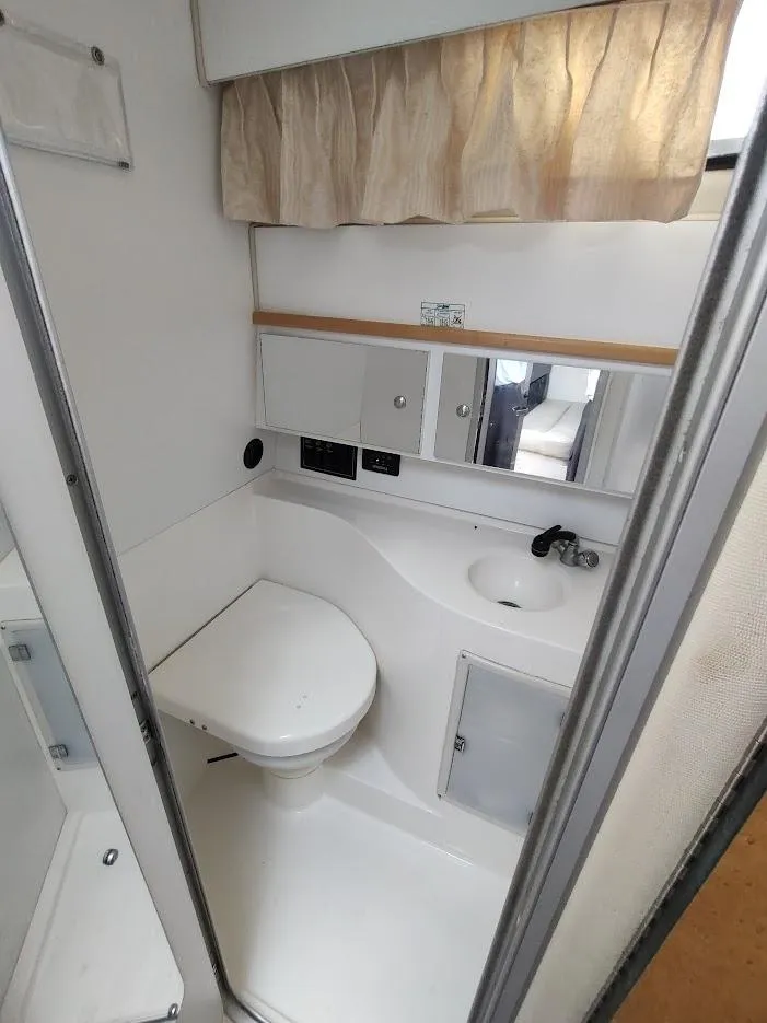 Slide: The Image of Wellcraft 330 Coastal 1997 - 73