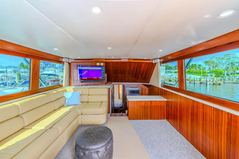 Slide: The Image of Luxurious interior of 1982 Hatteras 46 Convertible yacht with leather seating and wood accents. - 13