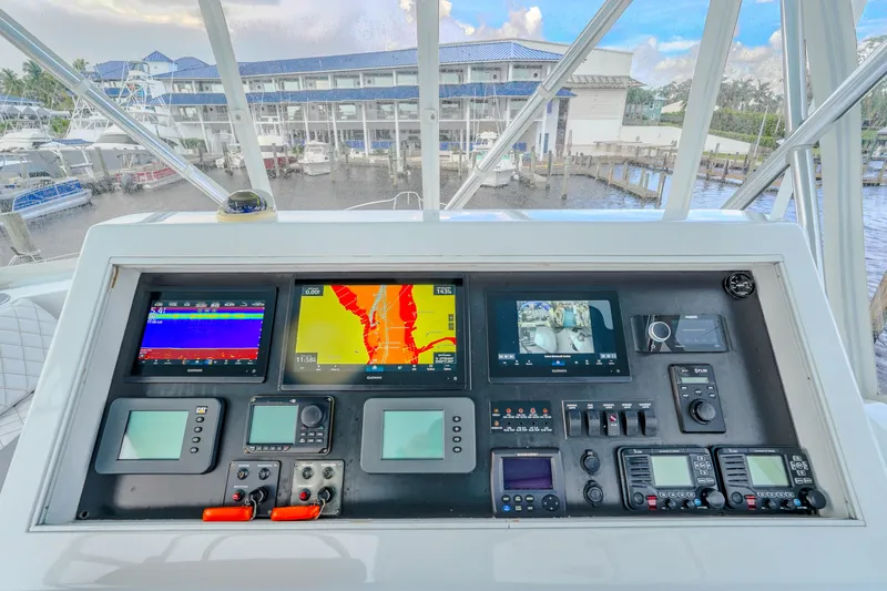 Slide: The Image of Control panel of 1982 Hatteras 46 Convertible yacht with navigation screens. - 43