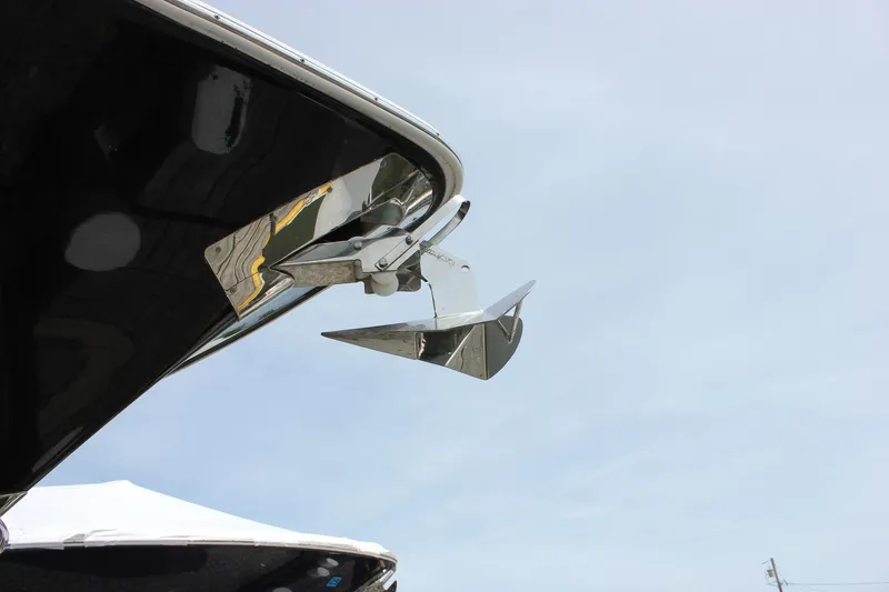 Slide: The Image of 2022 Sea Hunt Gamefish 27 Forward Seating boat anchor detail against clear sky. - 12