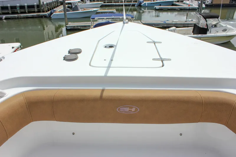 Slide: The Image of 2022 Sea Hunt Gamefish 27 Forward Seating boat at marina dock. - 17