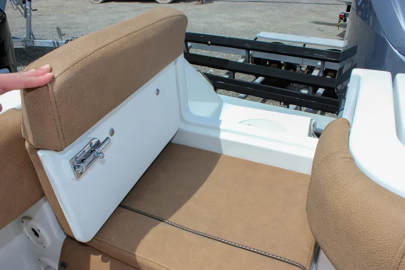 Slide: The Image of 2022 Sea Hunt Gamefish 27 Forward Seating with tan upholstery and storage compartment. - 23