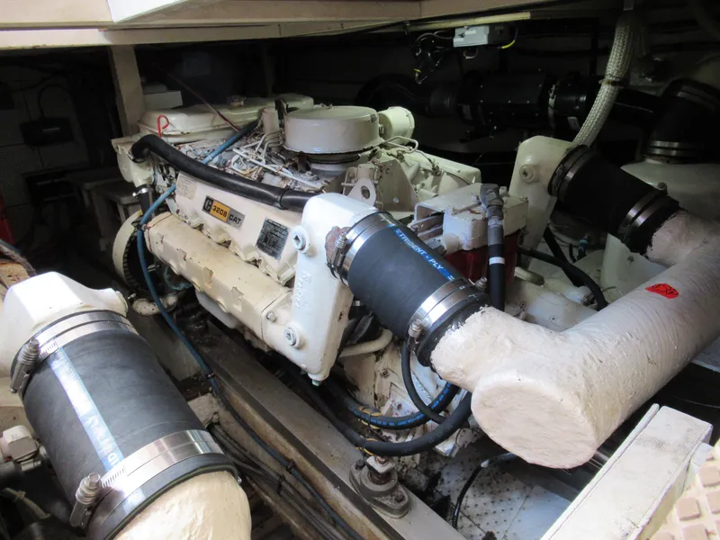 Slide: The Image of Engine room of 1985 Grand Banks 42 Classic yacht, showcasing mechanical components. - 20