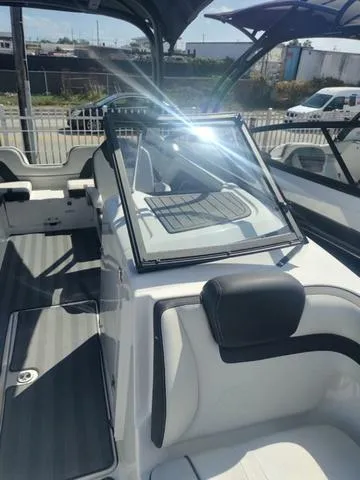 Slide: The Image of 2019 Yamaha Boats 242 Limited S E-Series interior with sleek seating and modern design. - 22