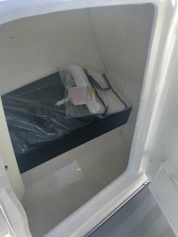 Slide: The Image of Storage compartment in 2019 Yamaha Boats 242 Limited S E-Series. - 26