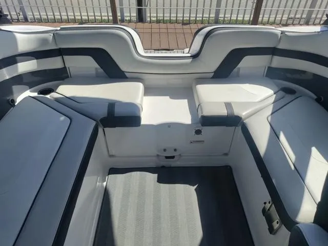 Slide: The Image of Interior of 2019 Yamaha Boats 242 Limited S E-Series, featuring sleek seating design. - 27