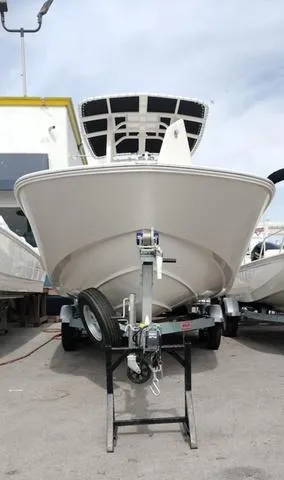 Slide: The Image of 2024 Boston Whaler 210 Montauk boat on trailer, front view. - 19