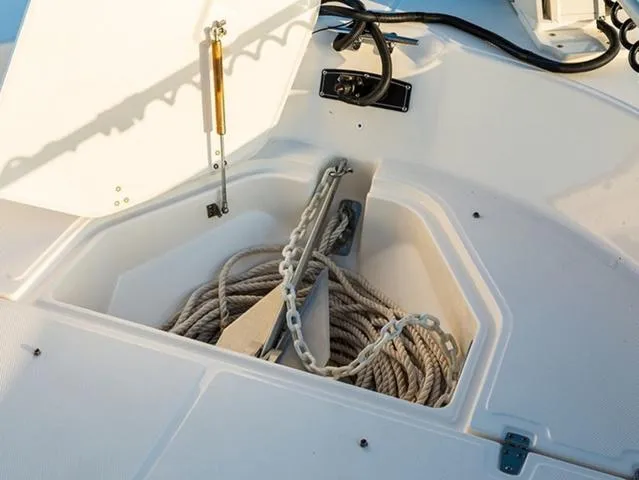 Slide: The Image of 2024 Boston Whaler 210 Montauk anchor storage with rope and chain. - 34