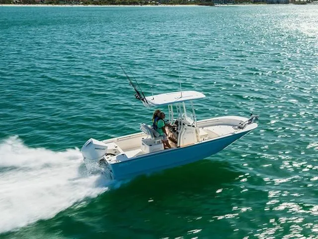 Slide: The Image of 2024 Boston Whaler 210 Montauk cruising on open water. - 35