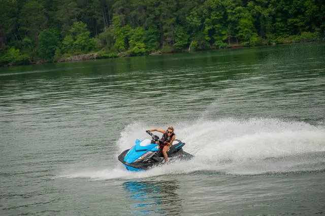 Slide: The Image of 2024 Yamaha Waverunner GP HO™ with Audio speeding on a lake. - 17