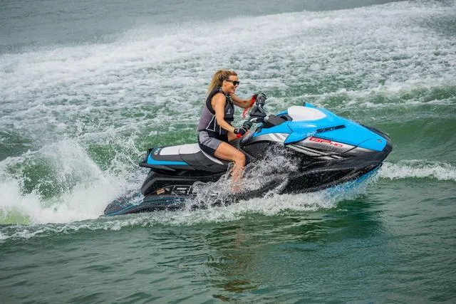 Slide: The Image of 2024 Yamaha Waverunner GP HO™ with Audio on water, rider enjoying high-speed adventure. - 20