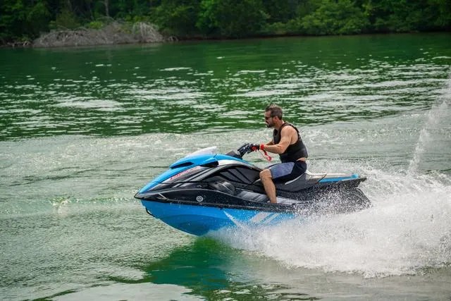 Slide: The Image of Man riding 2024 Yamaha Waverunner GP HO™ with Audio on a lake. - 24