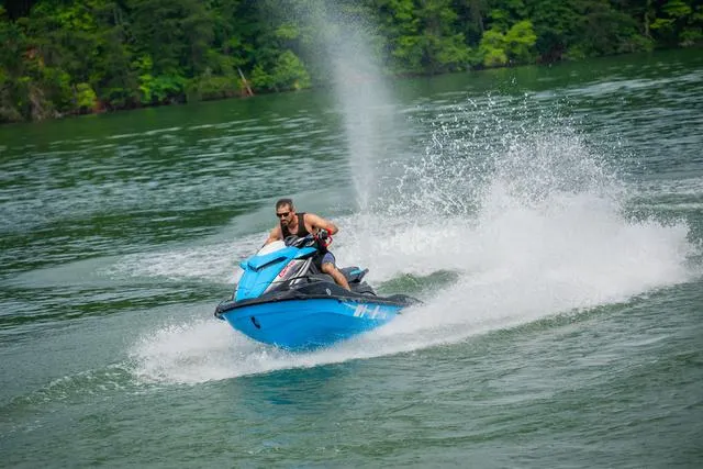 Slide: The Image of 2024 Yamaha Waverunner GP HO™ with Audio speeding on a lake. - 26