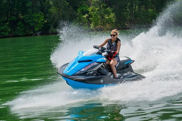 Slide: The Image of 2024 Yamaha Waverunner GP HO™ with Audio speeding on a lake. - 28