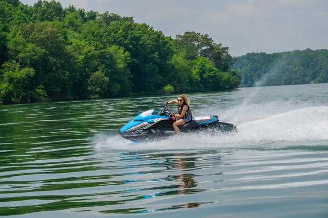 Slide: The Image of 2024 Yamaha Waverunner GP HO™ with Audio speeding on a scenic lake. - 29