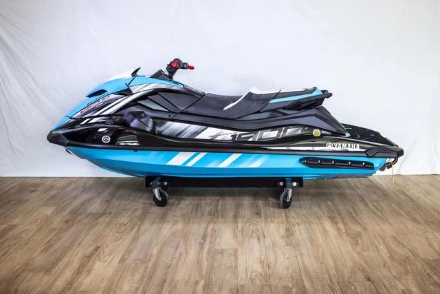 Slide: The Image of 2024 Yamaha Waverunner GP HO™ with Audio, blue and black, on display indoors. - 3