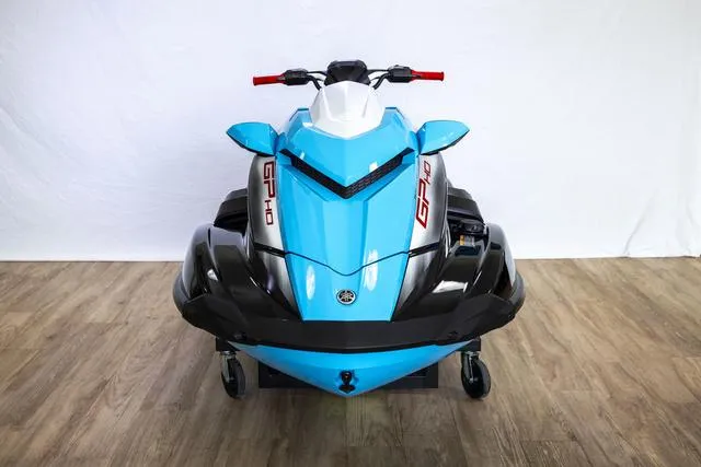 Slide: The Image of 2024 Yamaha Waverunner GP HO with Audio, blue and black, front view on wooden floor. - 4