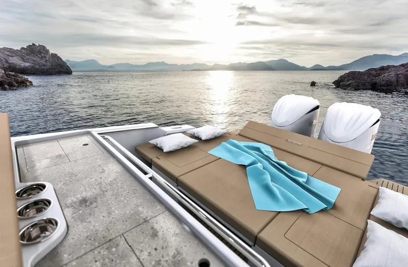 Slide: The Image of Luxurious STERK 31 WB Sport yacht, 2025 model, with sunbathing deck and scenic ocean view. - 32