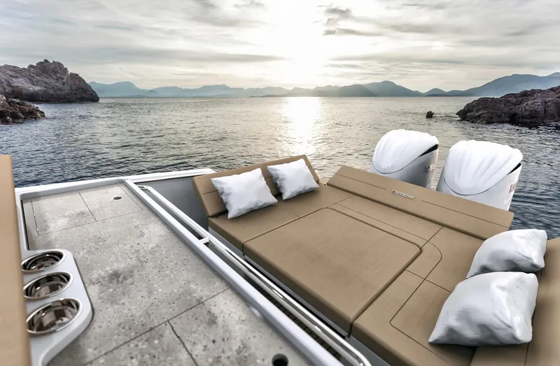 Slide: The Image of Luxurious STERK 31 WB Sport yacht, 2025 model, with sunbed and scenic ocean view. - 33